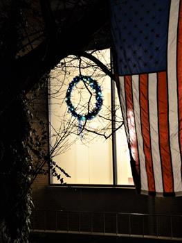 Project Blue Light wreath illuminated for fallen Bucks officers