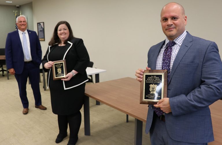 District Attorney Matthew Weintraub presents awards for excellence