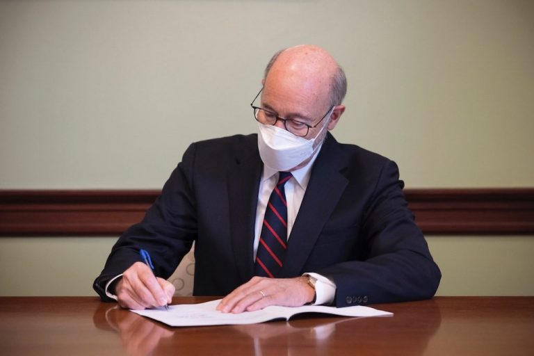 Wolf signs legislation